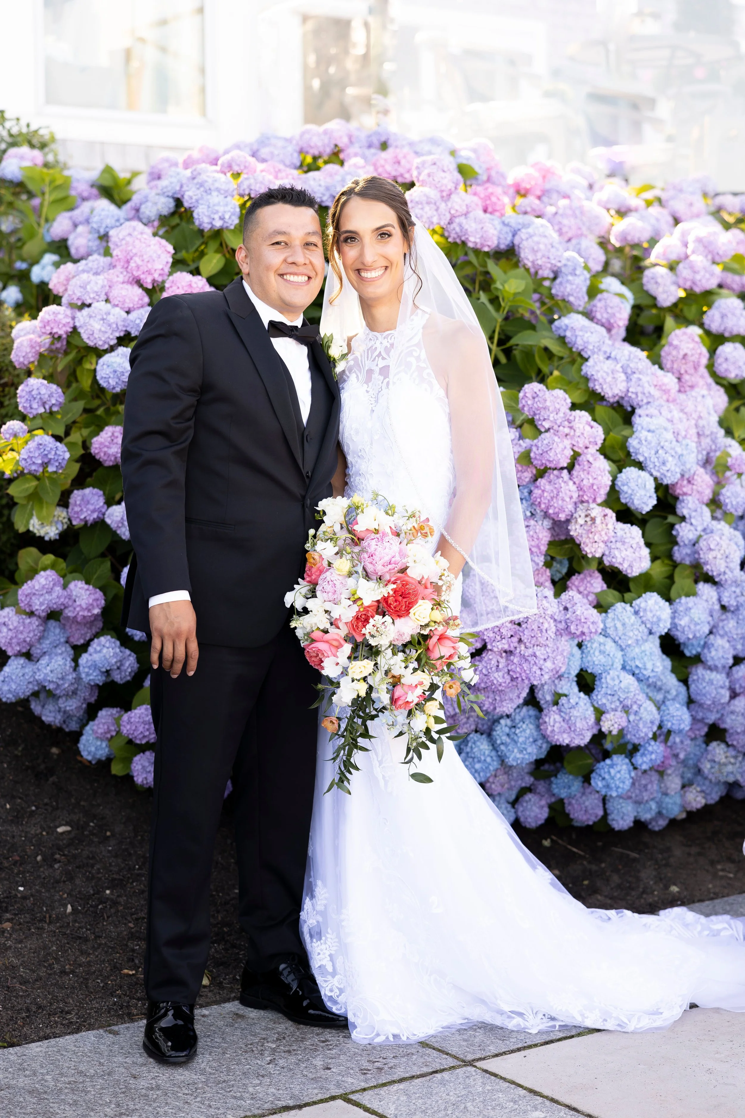 cape cod wedding wequassett wedding bg pose with hydrangeas