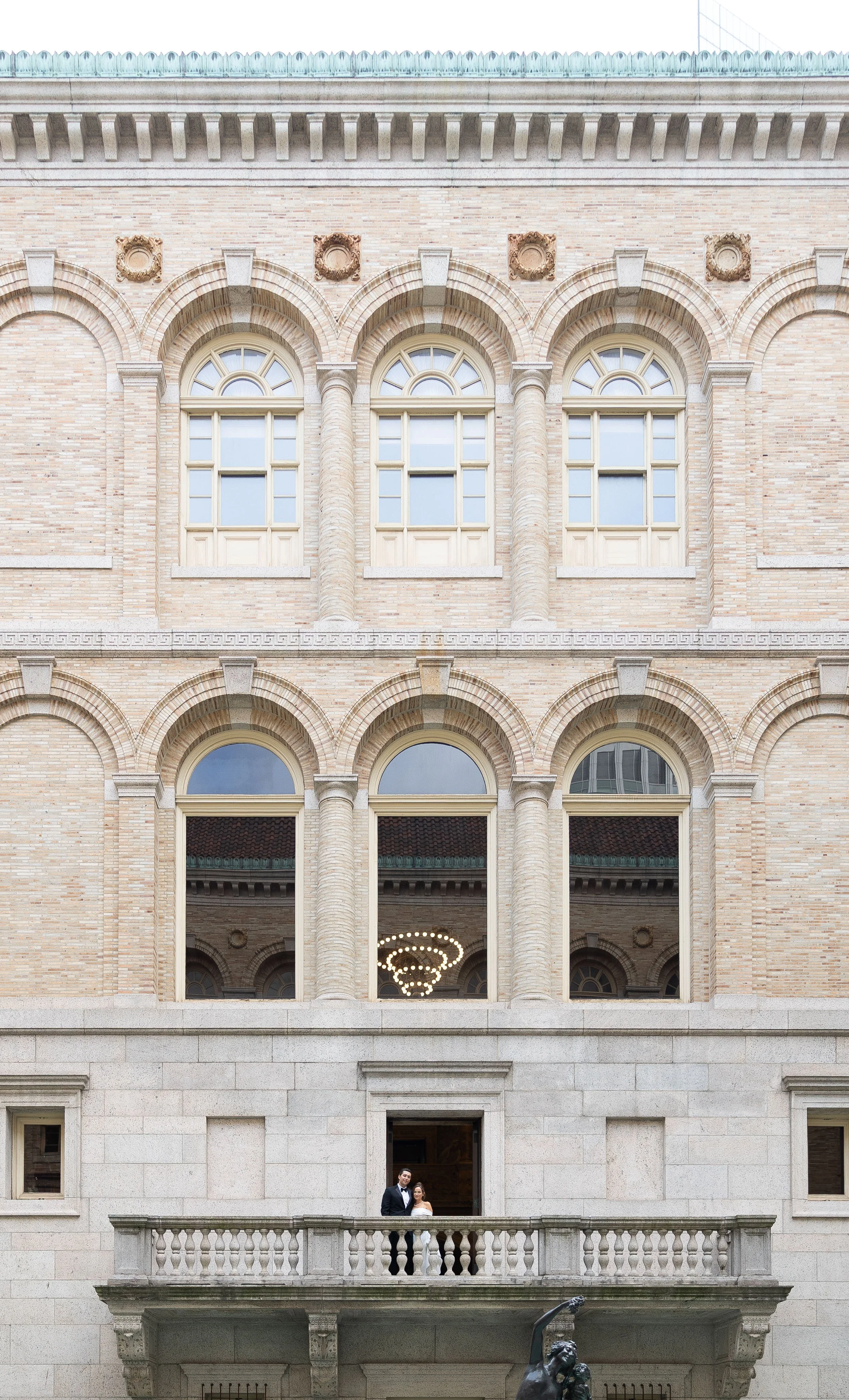 boston public library wedding bride  groom balcony view