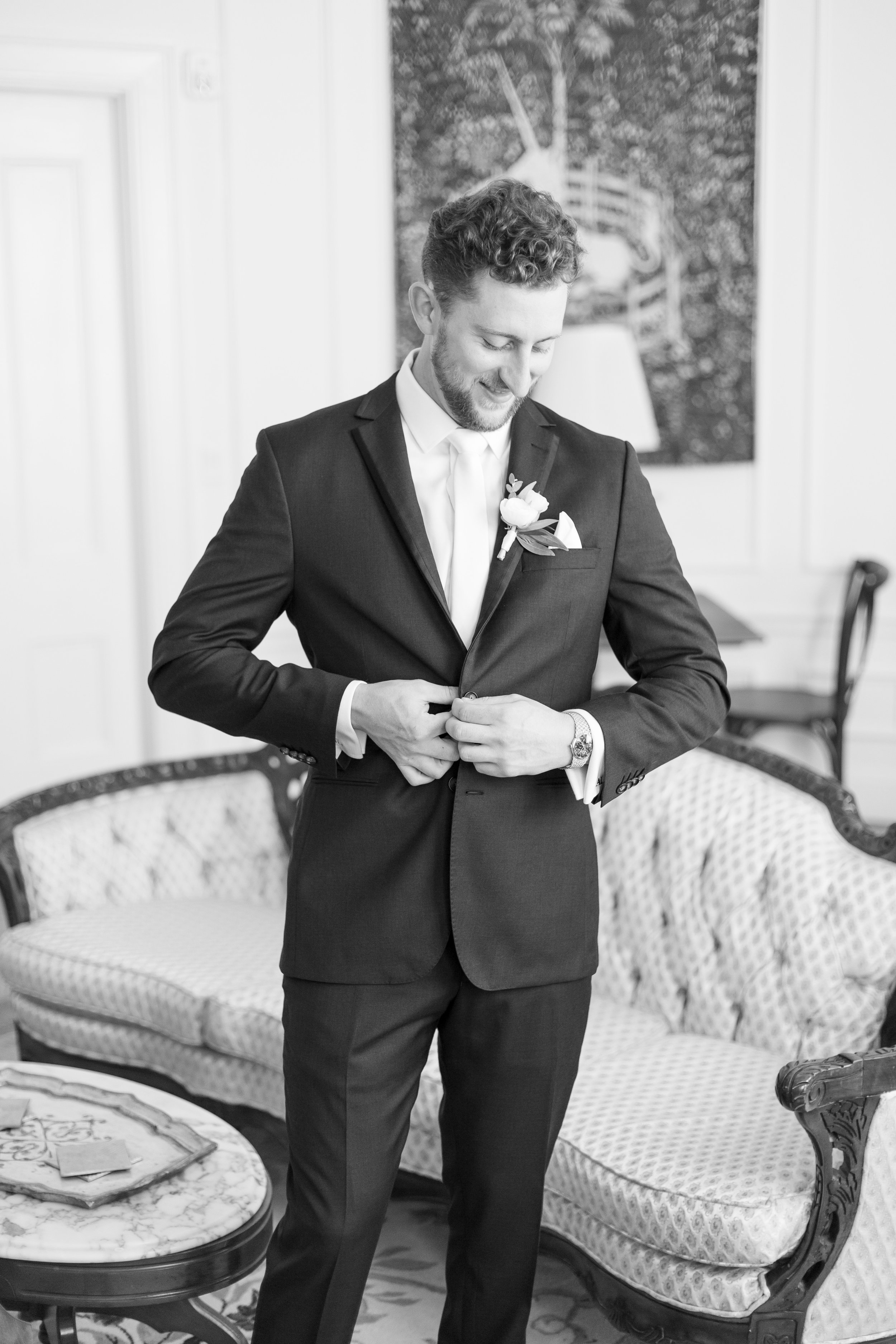 new hampshire wedding aldworth manor groom buttoning jacket getting ready