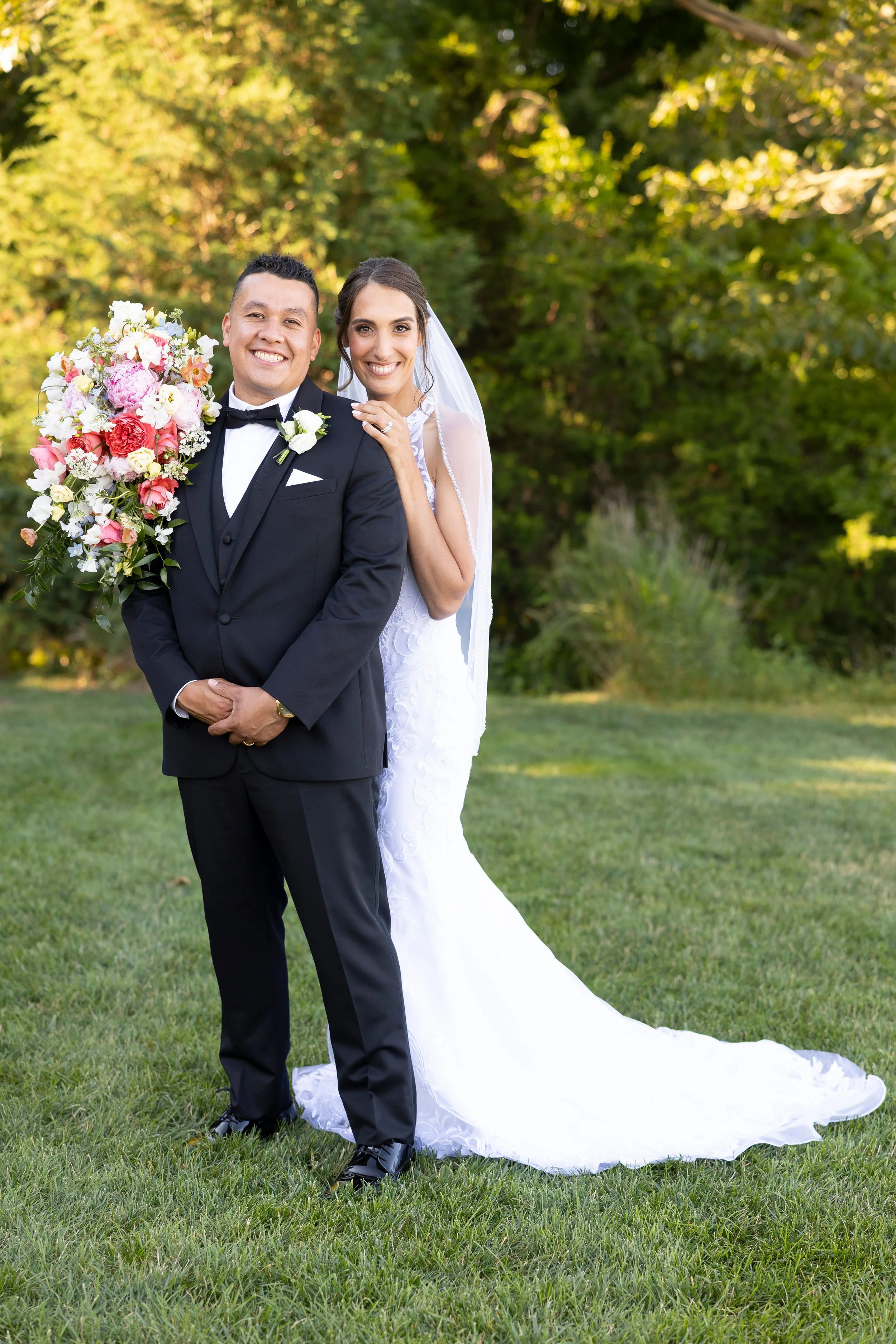 cape cod wedding wequassett wedding bg pose with boquet