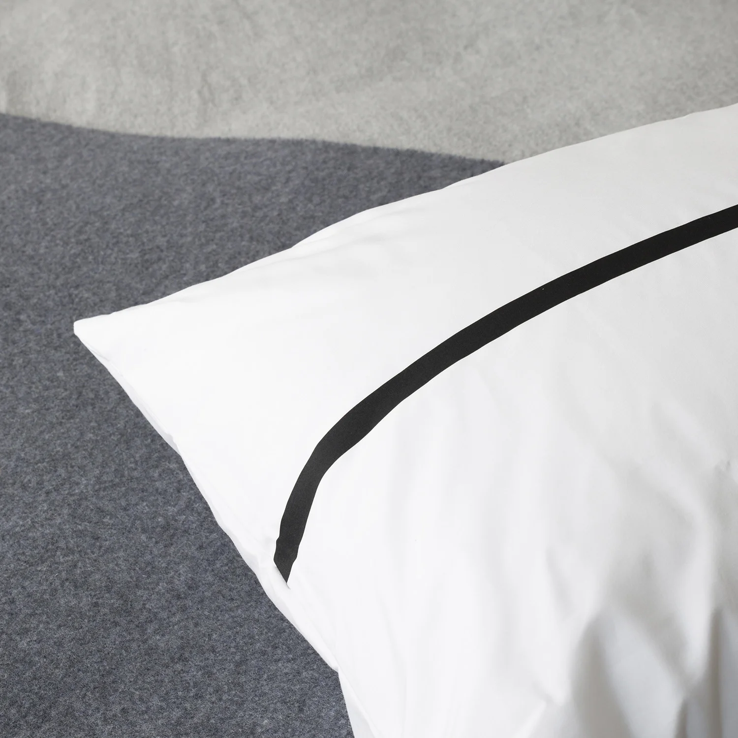 Together pillow cases, connected with a line, created by Above and Beyond