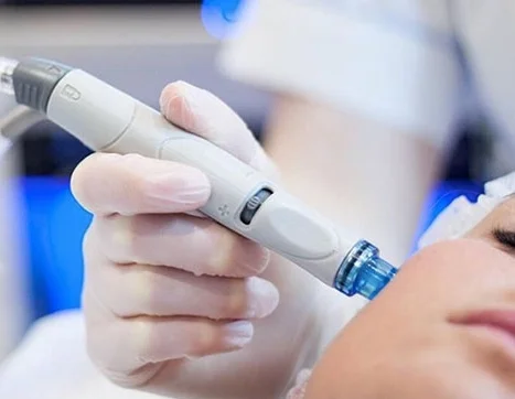 The HydraFacial handheld device in action (image swiped from HydraFacial's Instagram feed )
