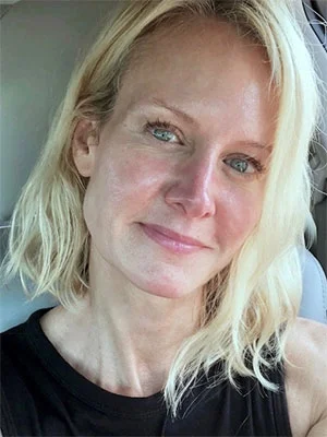 A makeup-free, post-HydraFacial selfie taken in the parking lot.