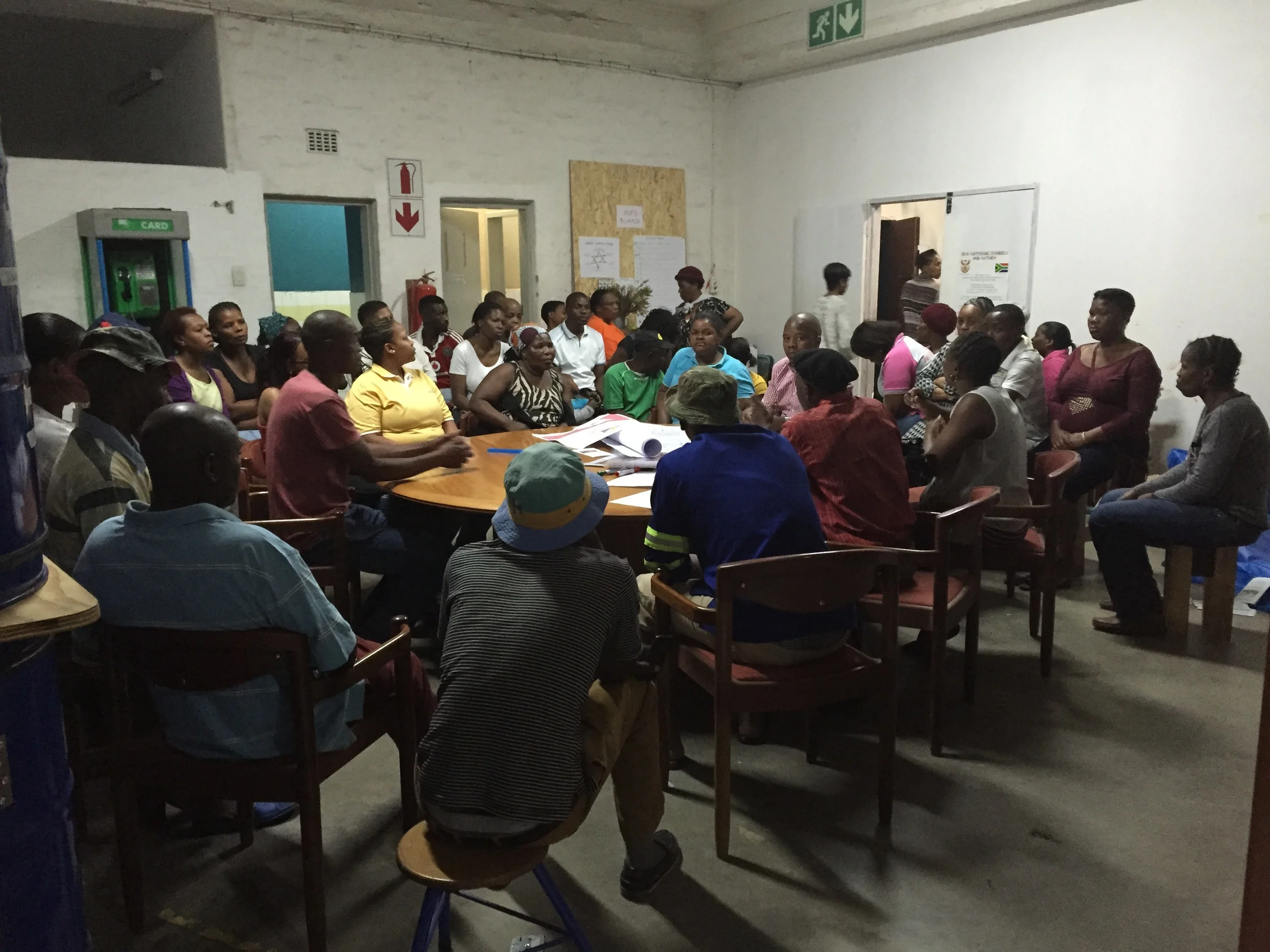 Community forum meeting taking place in Bjala Square