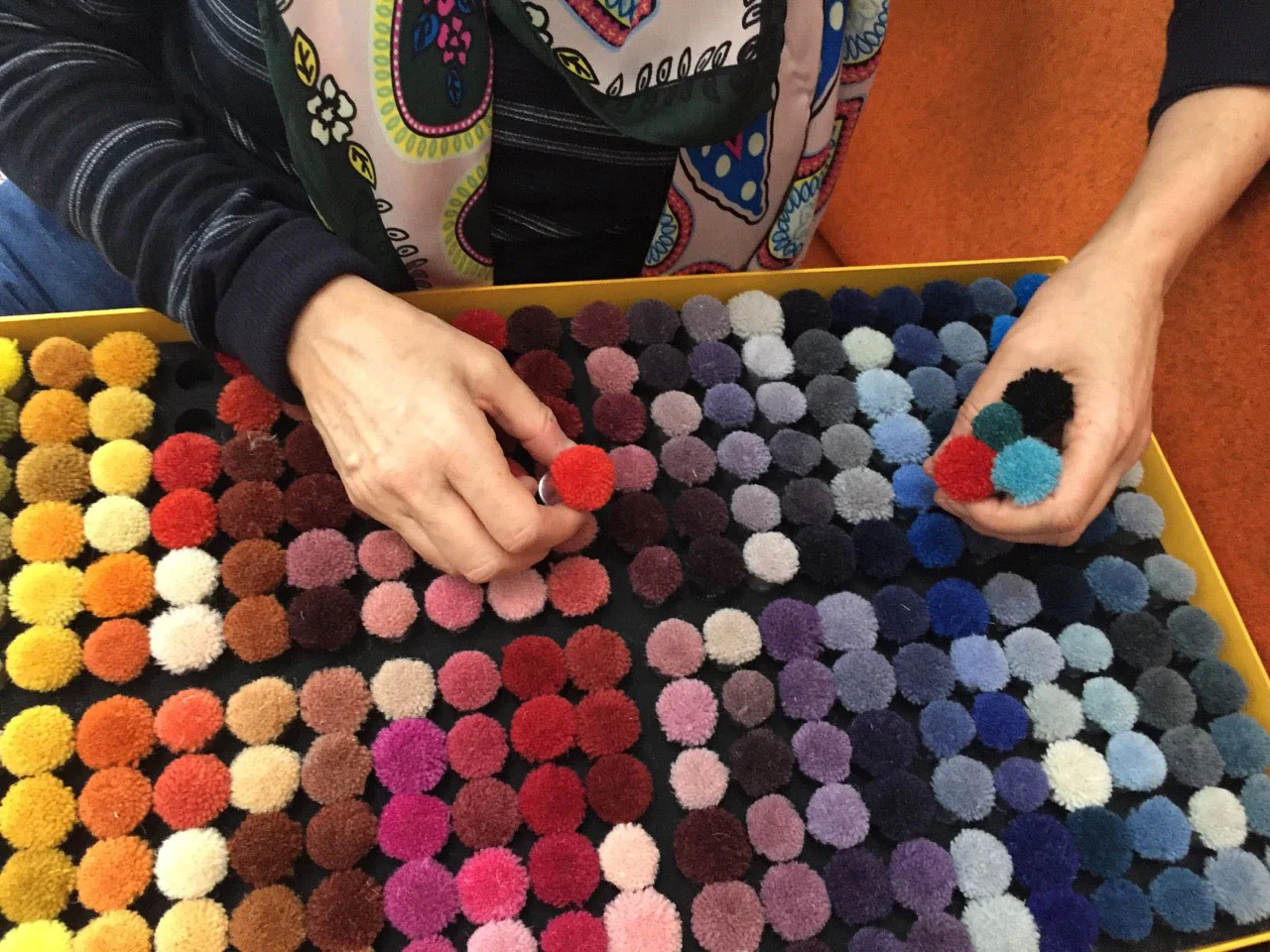 Choosing the pure new wool colours to match the designs