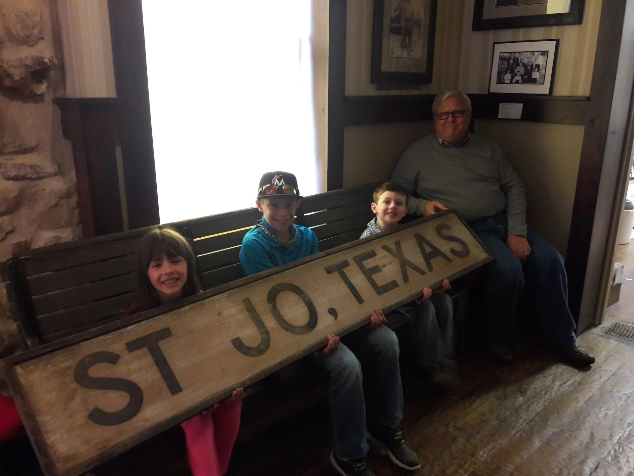 Saint Jo sign with g-kids and Bill .jpg