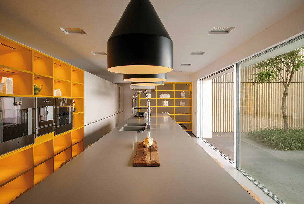 With the extensive worktop, high-grade appliances and easy-to-access storage space, this is a room that begs to be cooked in. 
