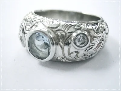 diamonds with aquamarine set in white gold