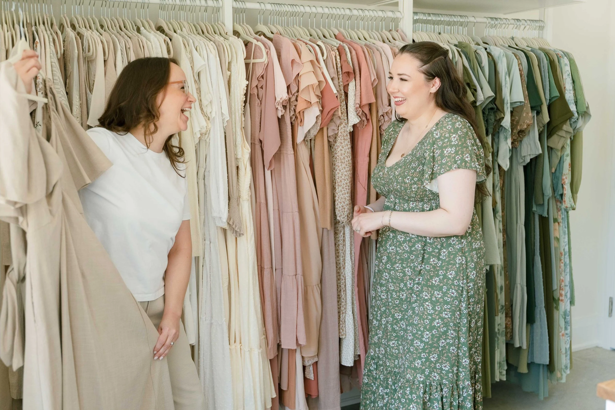 Client browsing wardrobe room with photographer at Grimsby photography studio