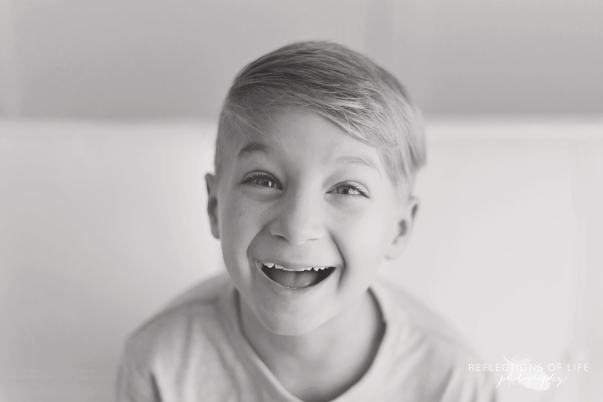 Little Boy Laughing in Black and White