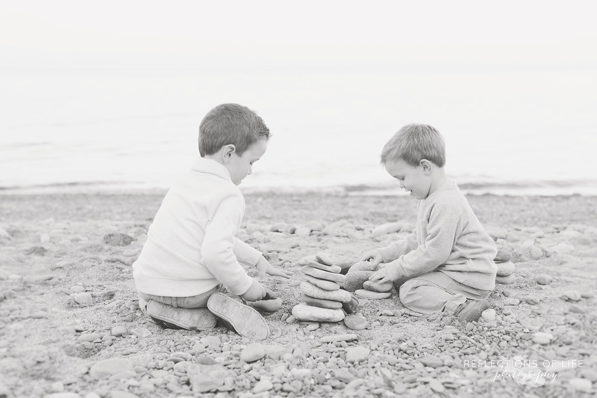 siblings on the beach in southern ontario canada