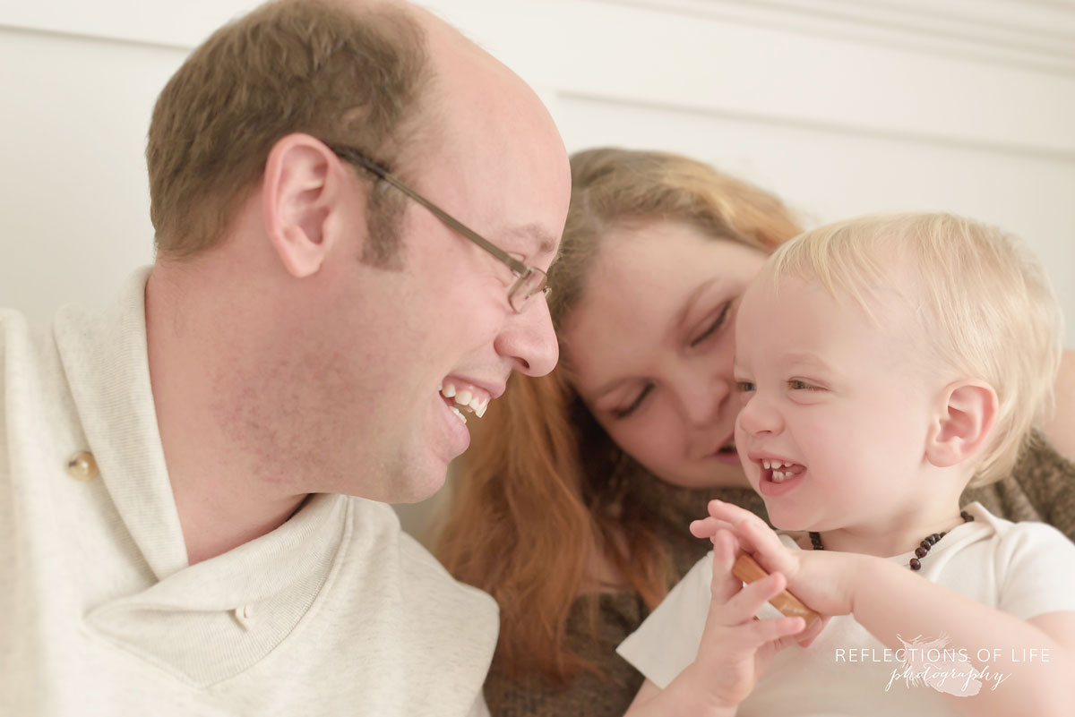 Relaxed family photos in natural light studio in Grimsby, Ontario, Canada