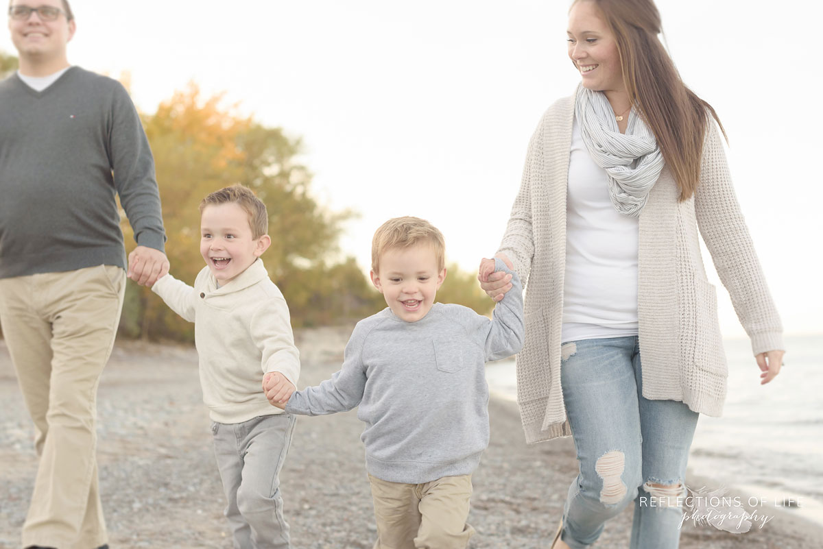 candid family photos on the beach in grimsby ontario canada