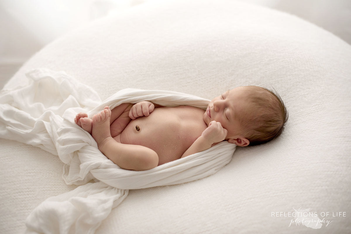 004 Top Ten Favourite Newborn Images baby wrapped in blanket peacefully