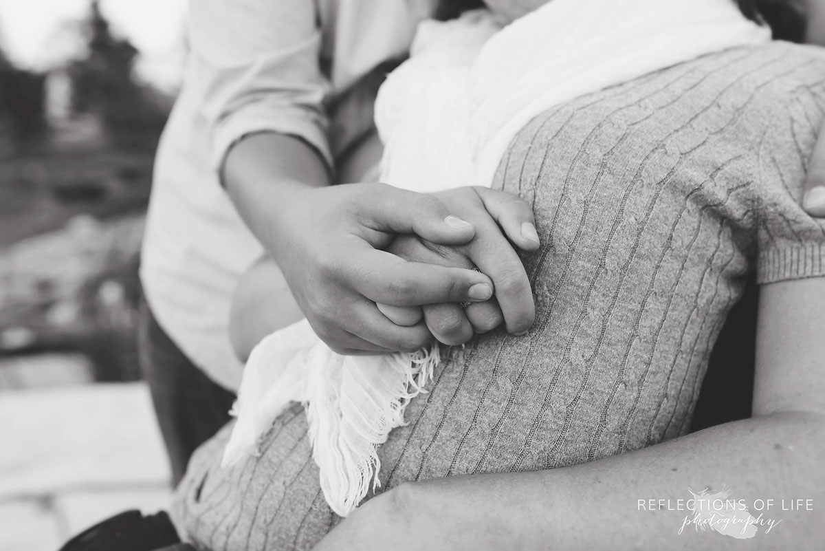 016 Connection between mother and son black and white hands