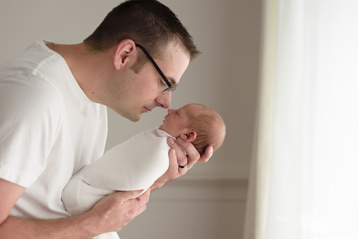 017 Daddy rubs noses with newborn Best Newborn Baby Photography Grimsby Ontario