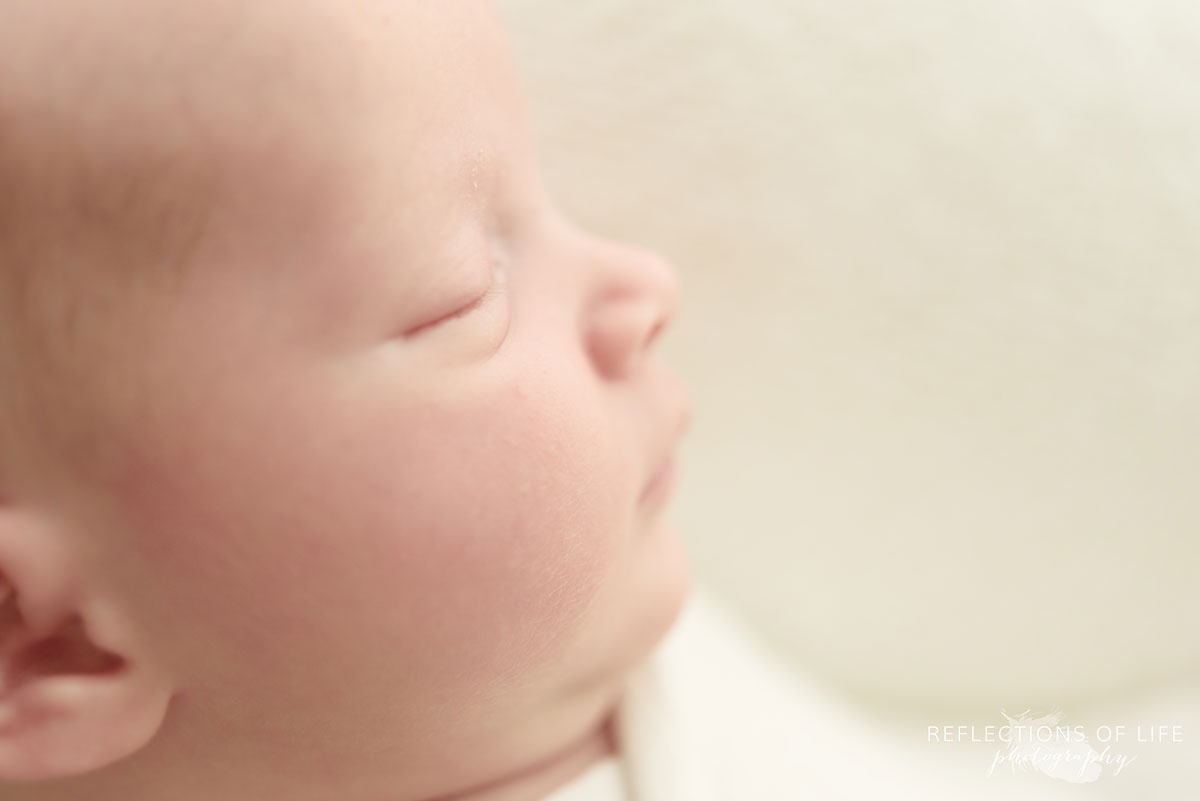 newborn baby close up of side profile and eyelashes 003