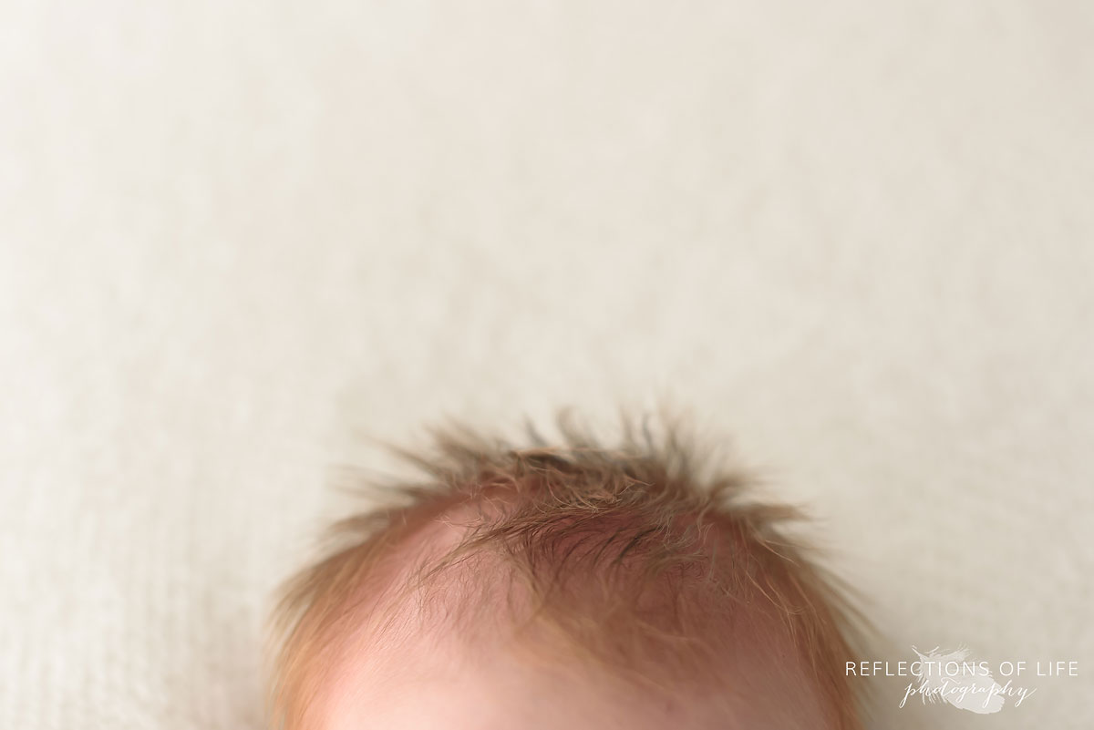 Redhead newborn baby hair