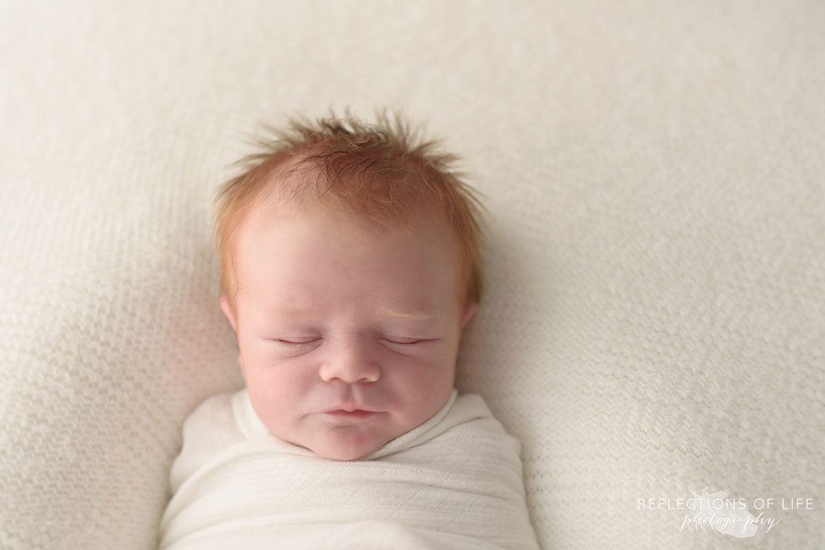 Newborn baby that looks like a mini Philip Seymour Hoffman