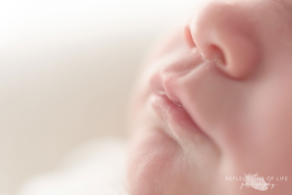 Close up image of newborn baby lips