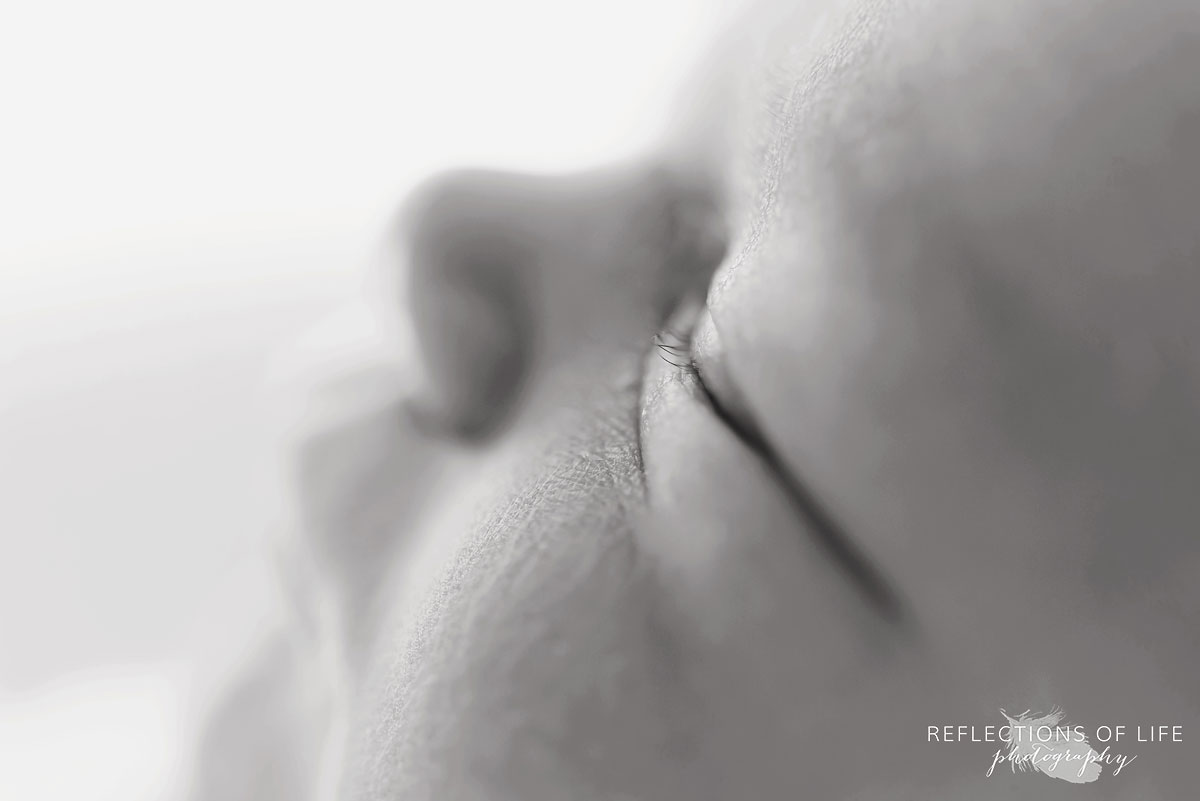 Close up image of newborn baby eyelashes