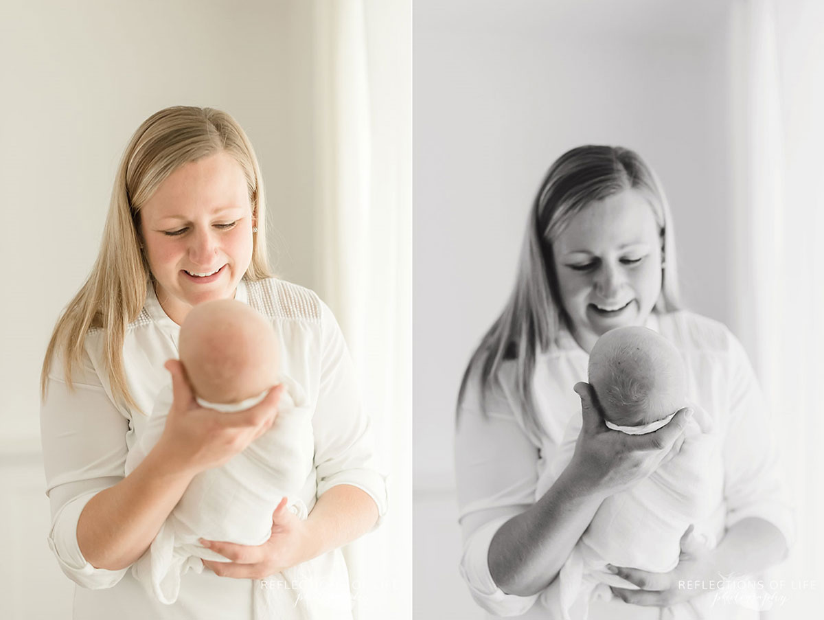 mom looking down at baby boy in natural light studio Grimsby