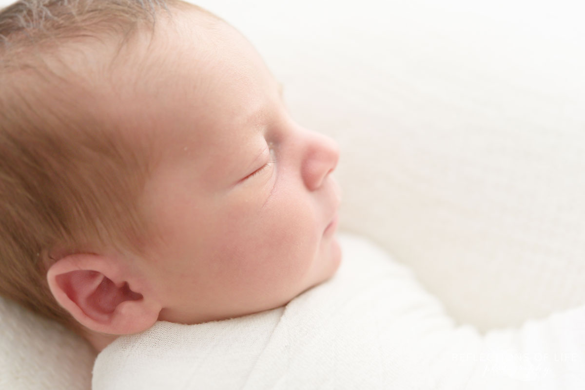 Profile shot of newborn baby boy