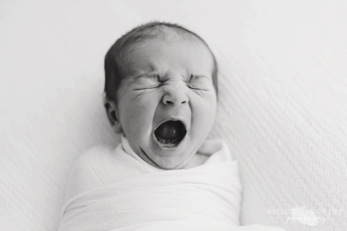 Niagara newborn baby yawning in black and white