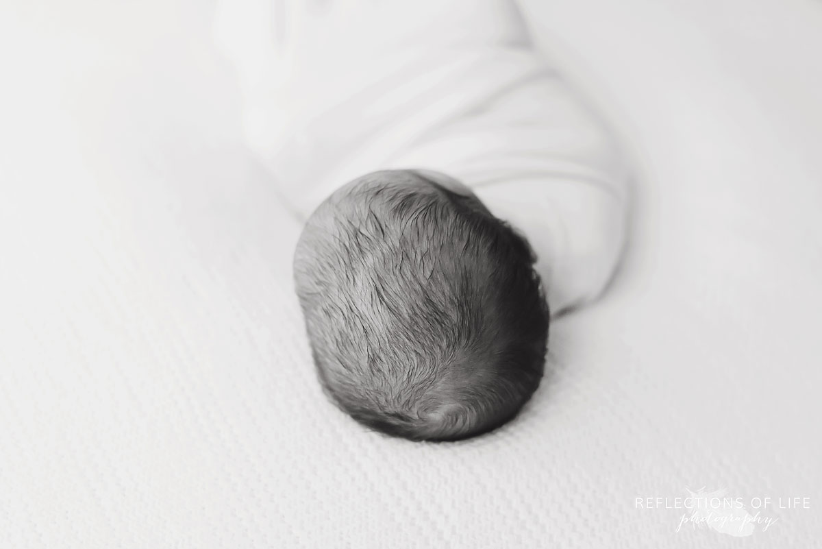 Newborn baby hair picture in black and white