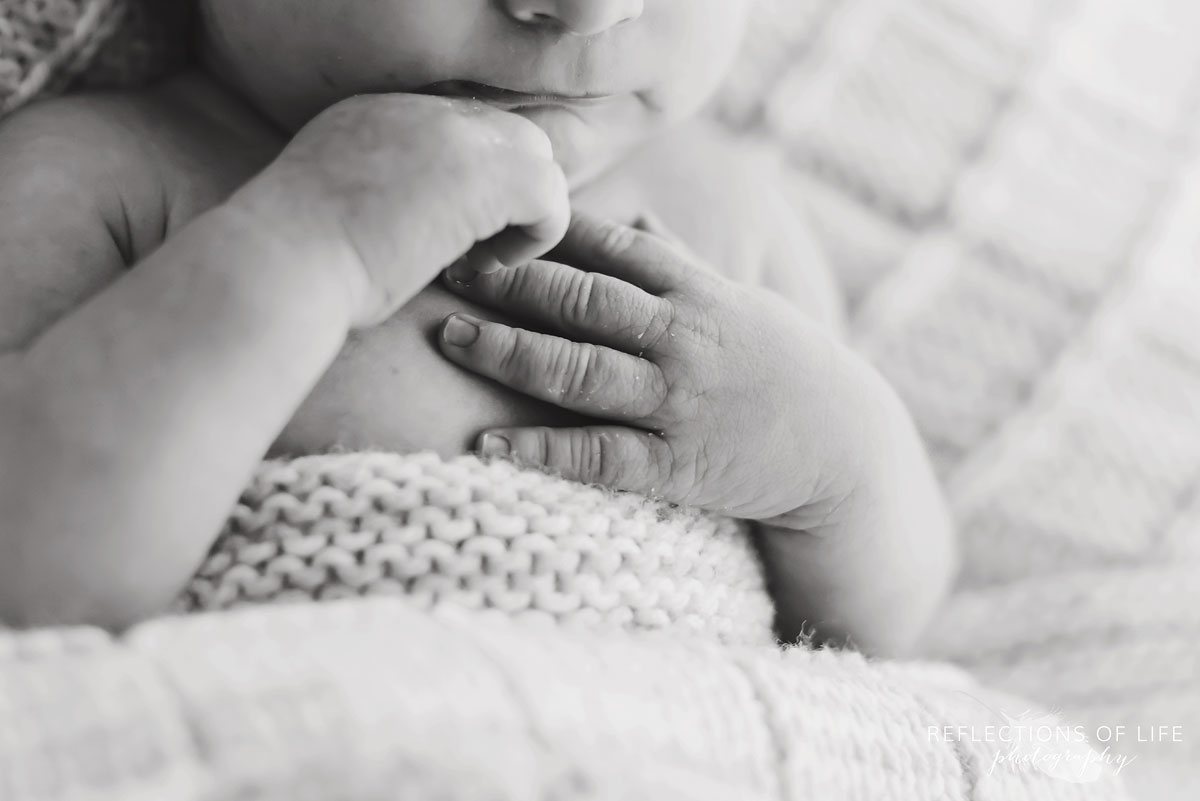 Close up of newborn baby hands