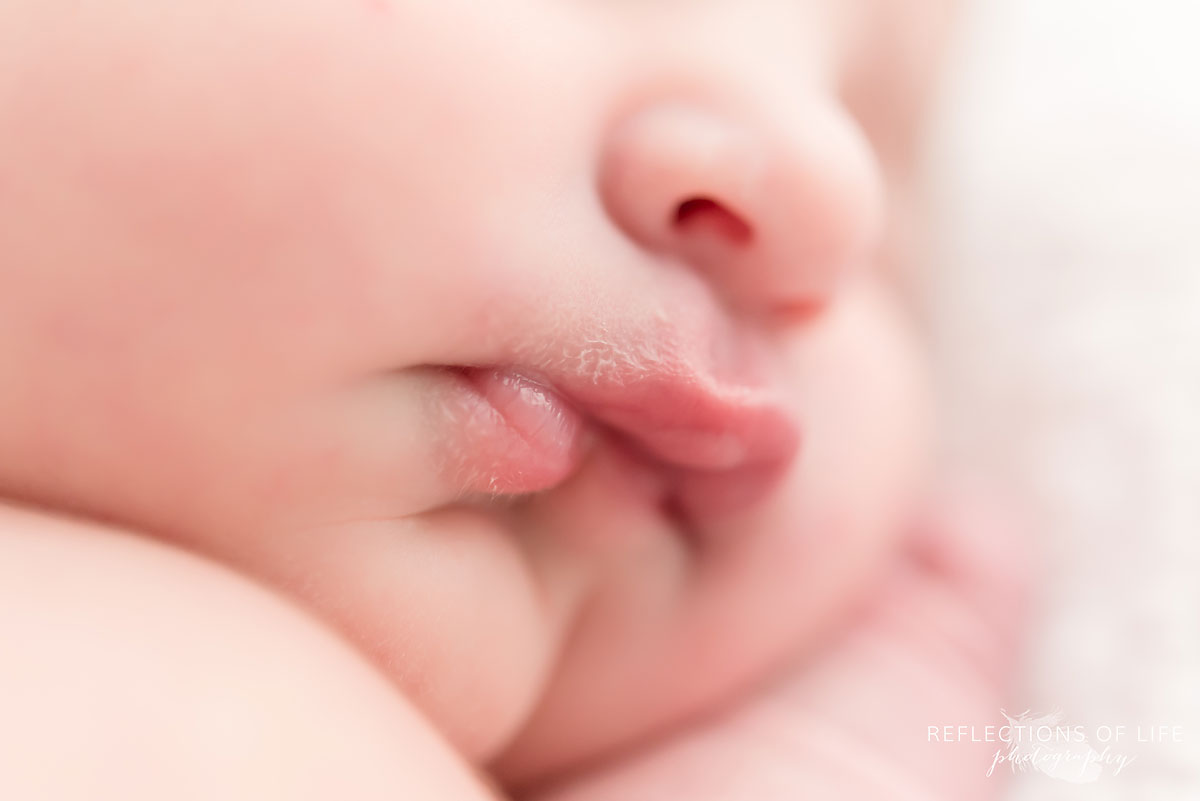 Adorable squishy newborn baby lips