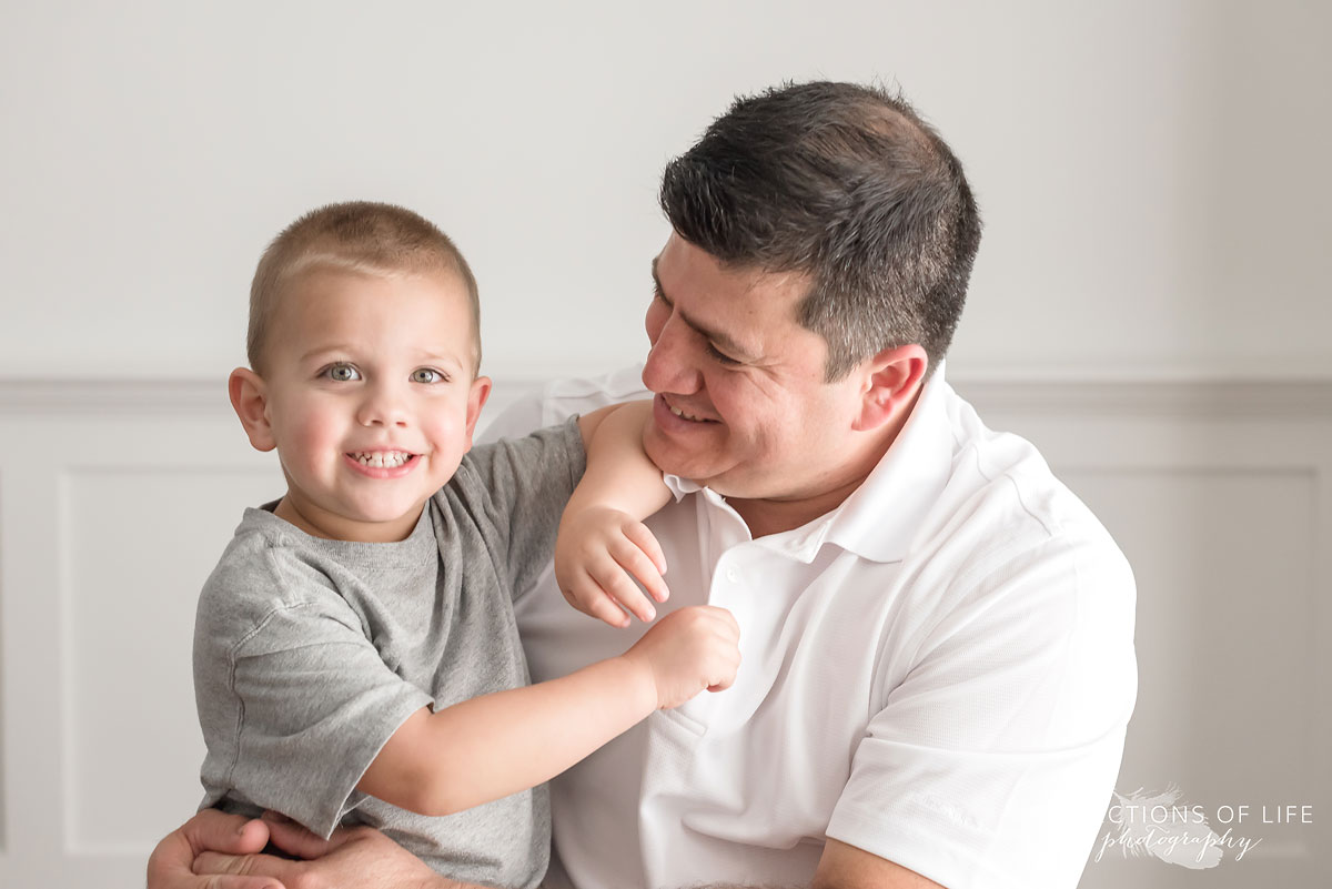 Dad looking at his son with love