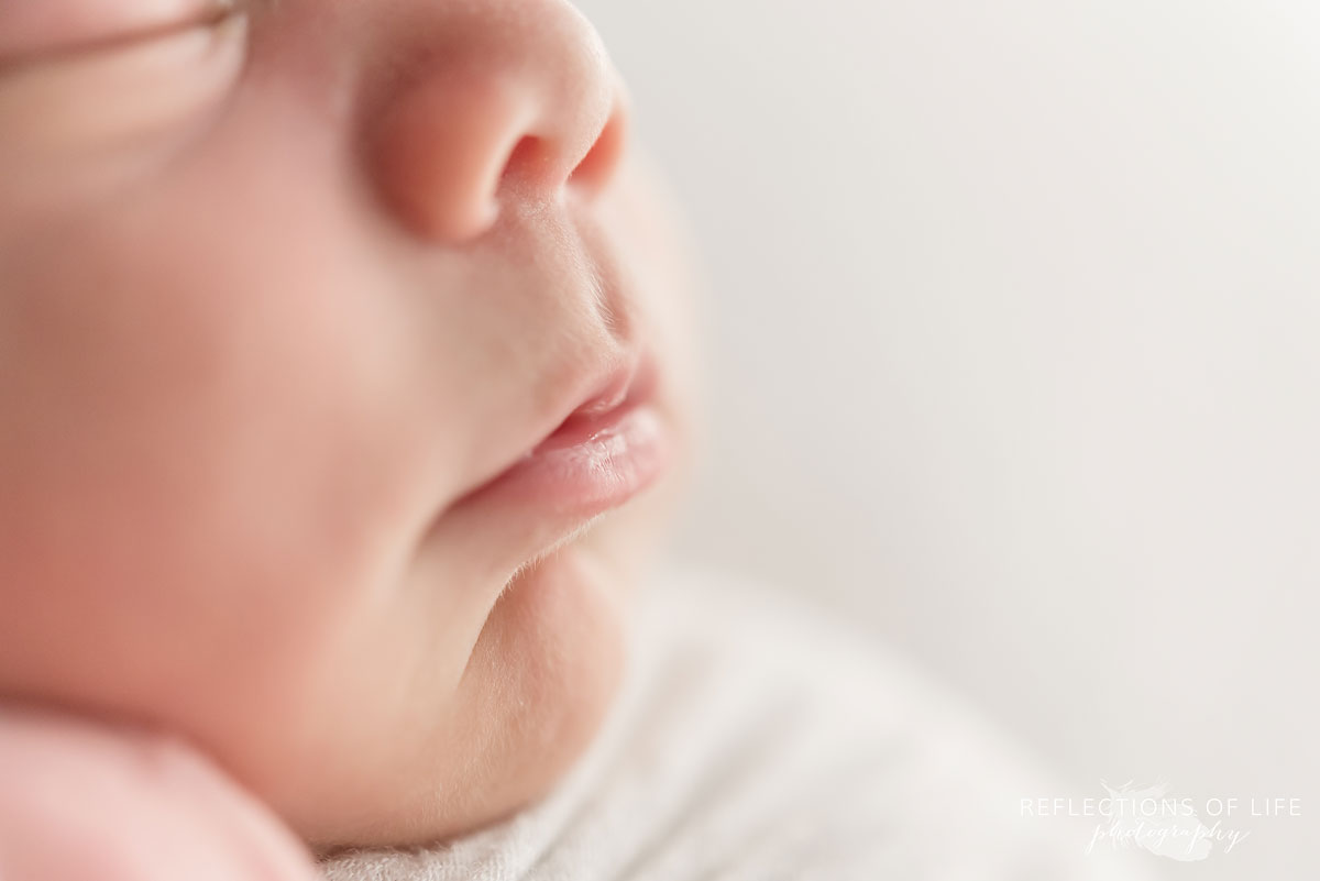 Close up of newborn baby boy lips