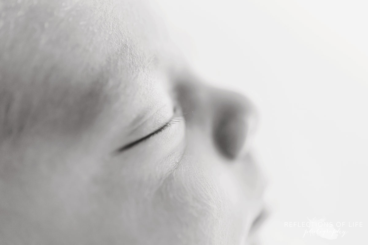 Closeup of newborn baby boy eyelashes