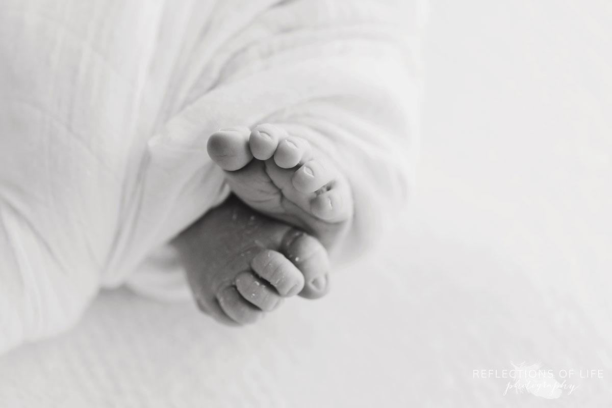 close up image of newborn baby toes