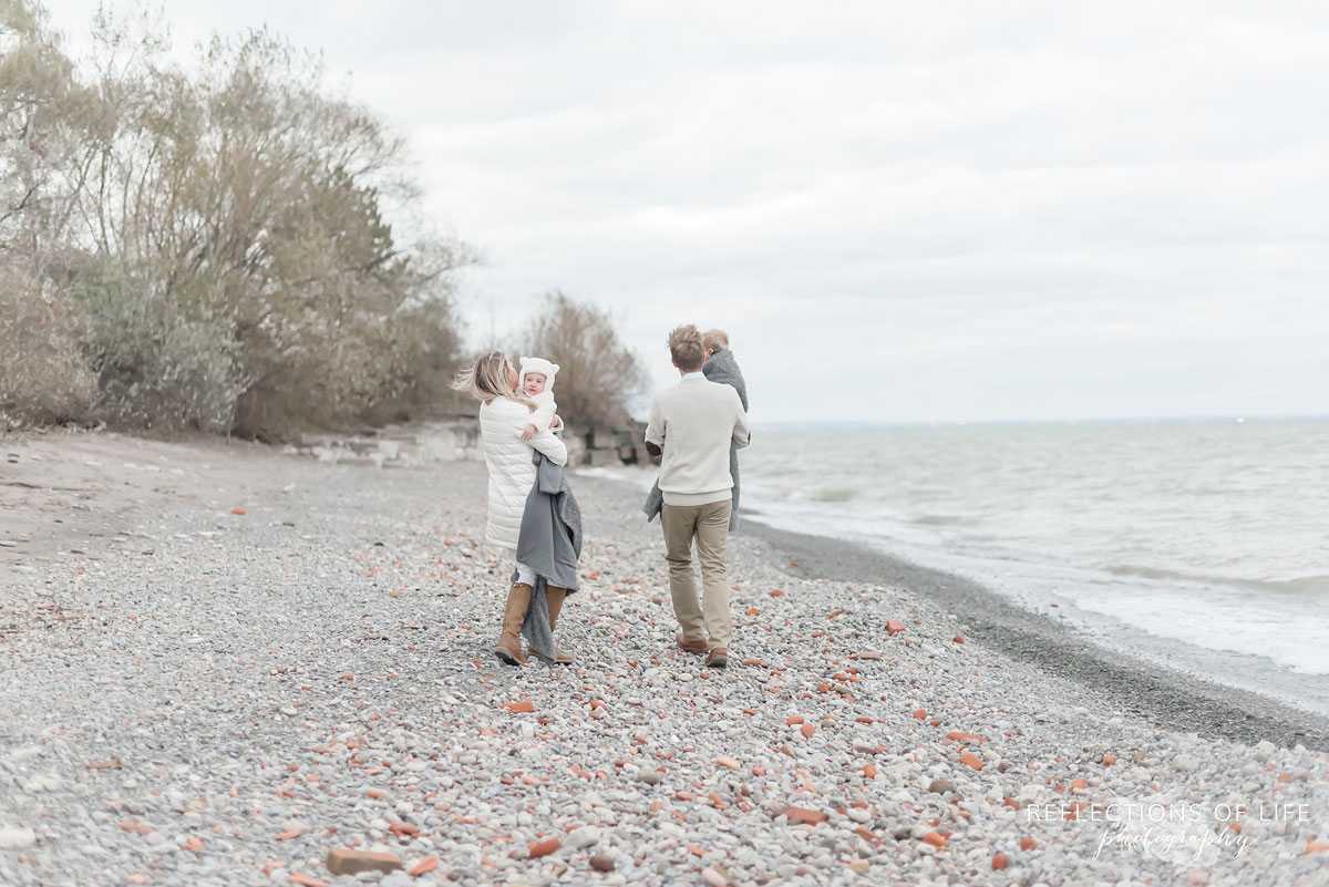 Famly photography on the beach in winter Canada