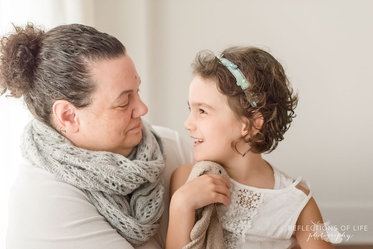 daughter looking at mother