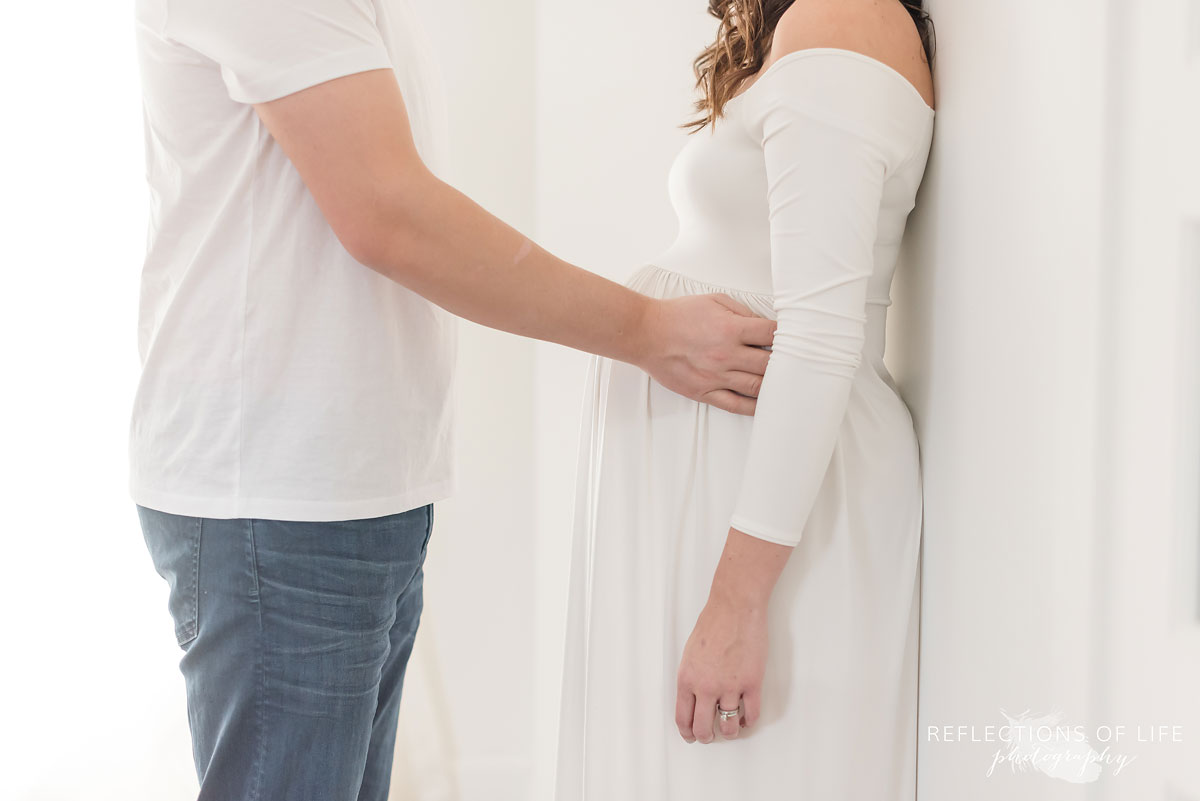 father holding mother to be
