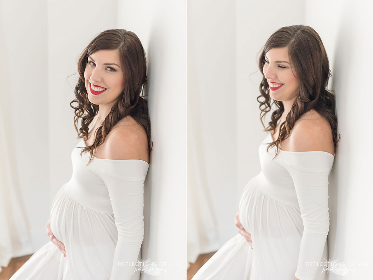pregnant mom to be leaning against wall smiling