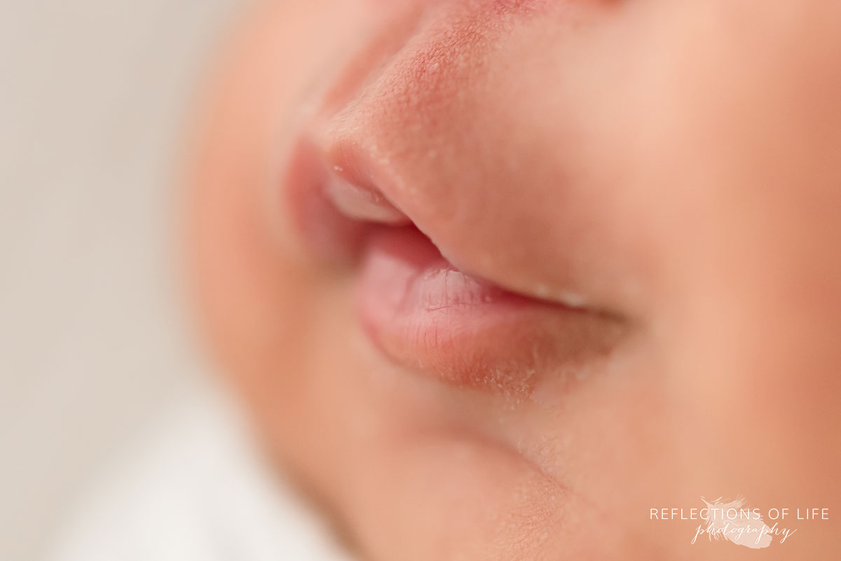 up close newborn baby lips