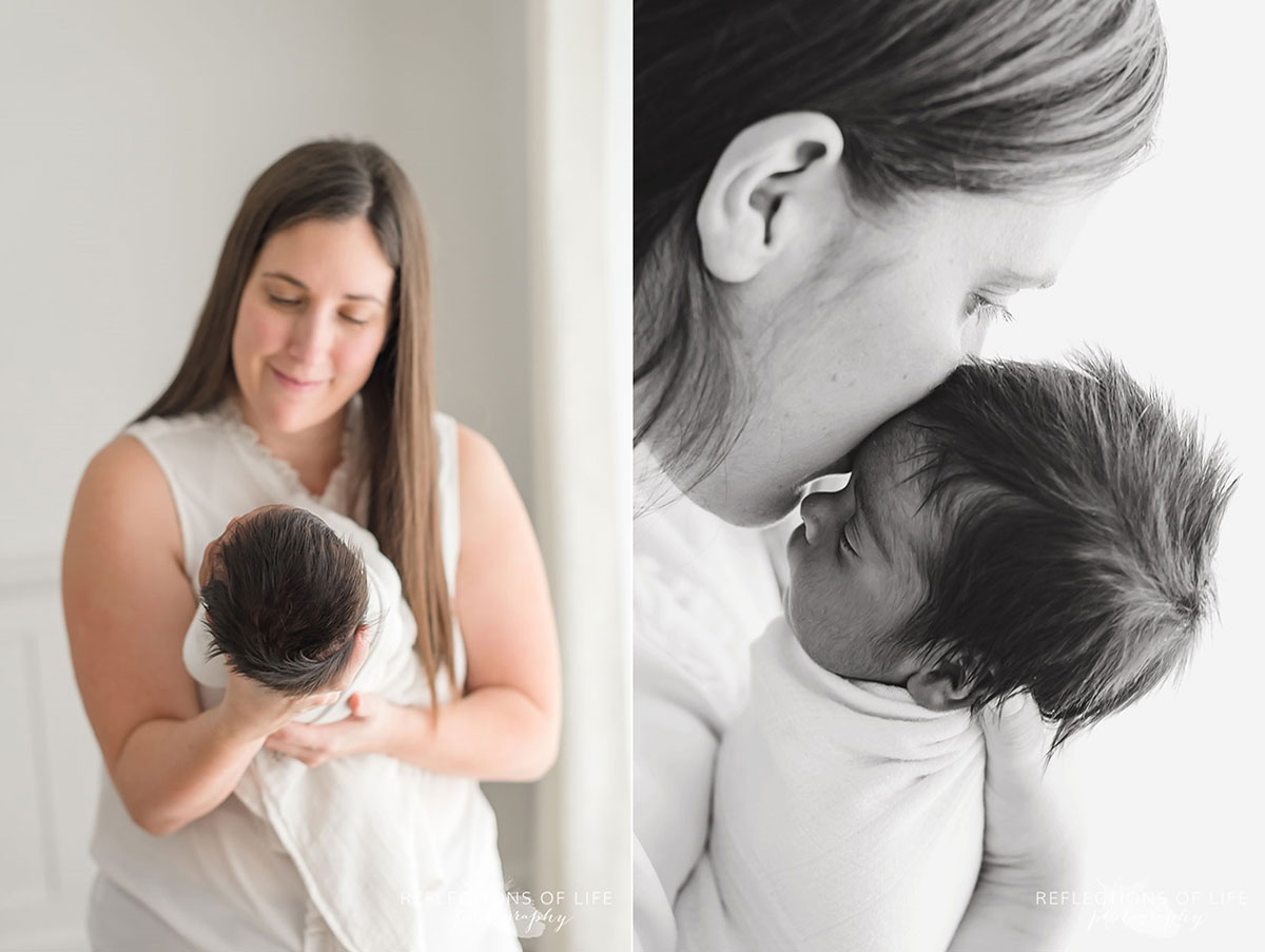 mother holding child kiss on forehead