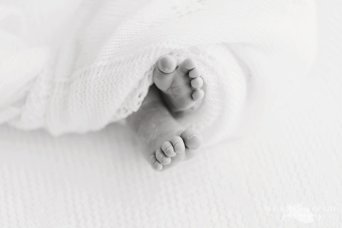 newborn baby feet black and white 