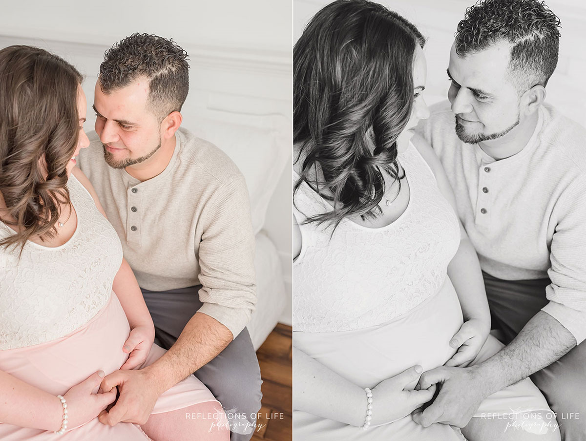 pregnant mom and dad looking into each others eyes
