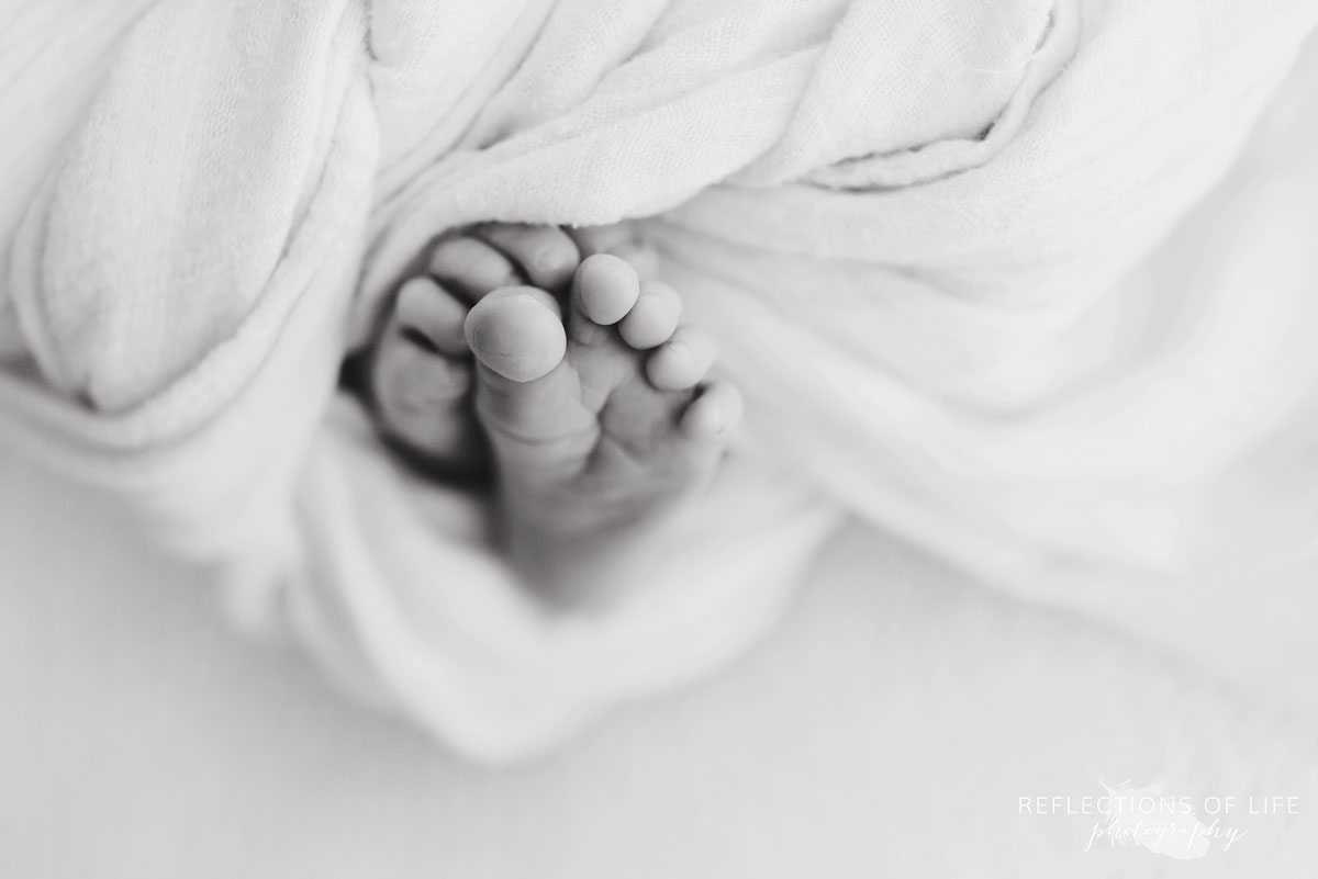 Newborn baby feet black and white