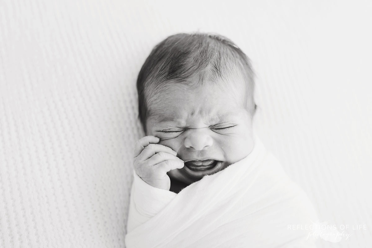 Niagara Newborn baby crying and fussing during photoshoot