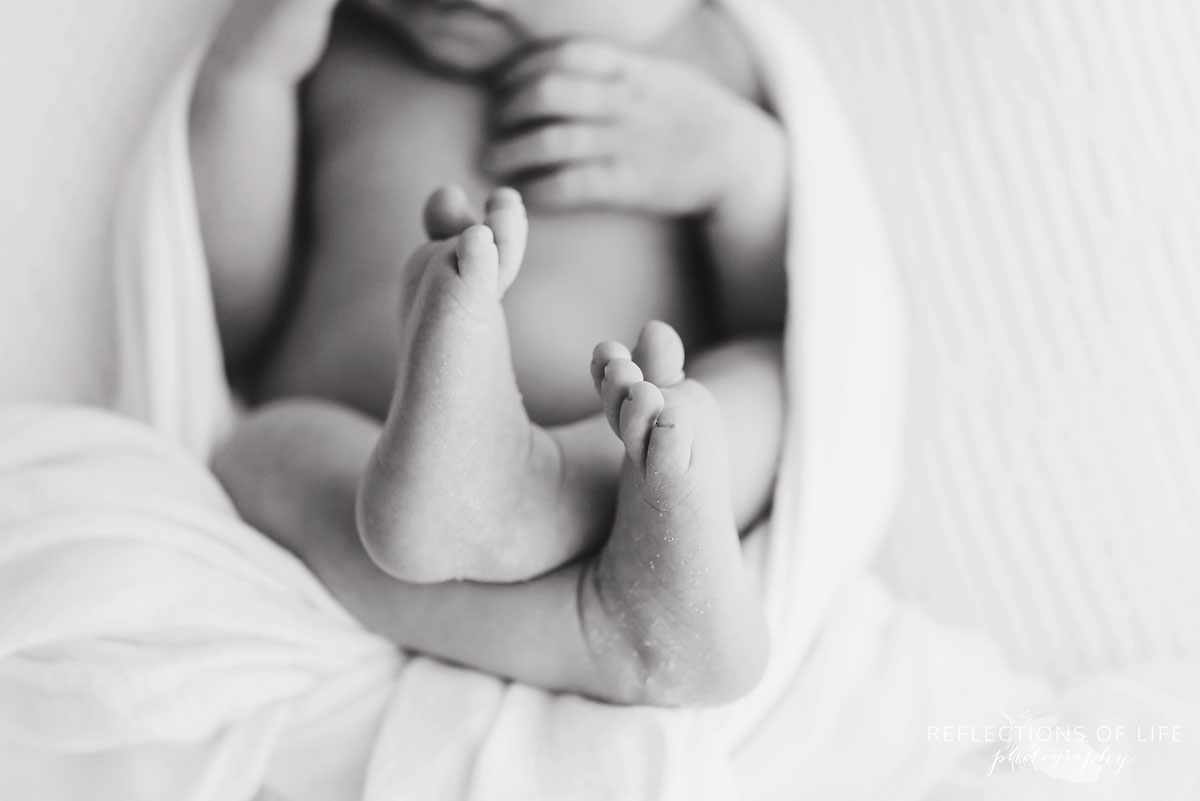 Newborn baby girl toes