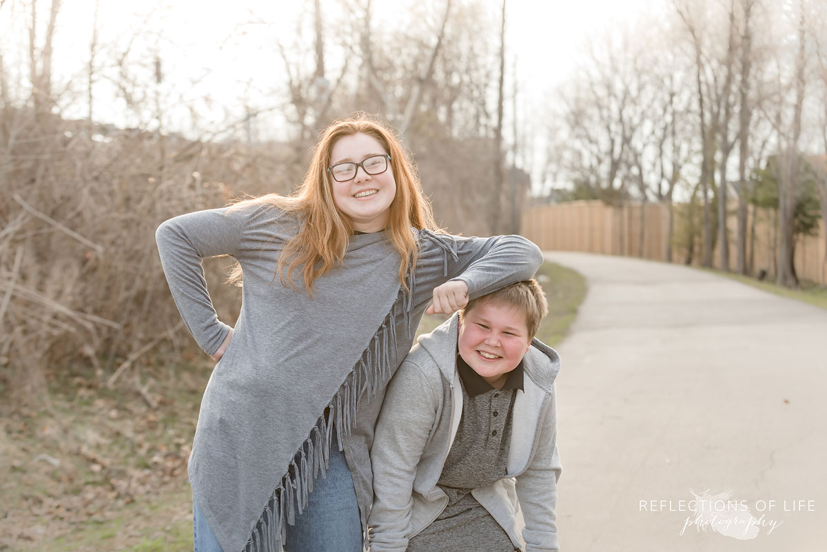 Siblings on a pathway in Niagara Region of Ontario