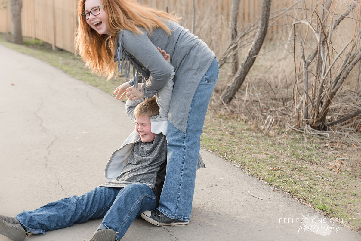 Fun candid sibling photography in Grimsby Ontario Canada