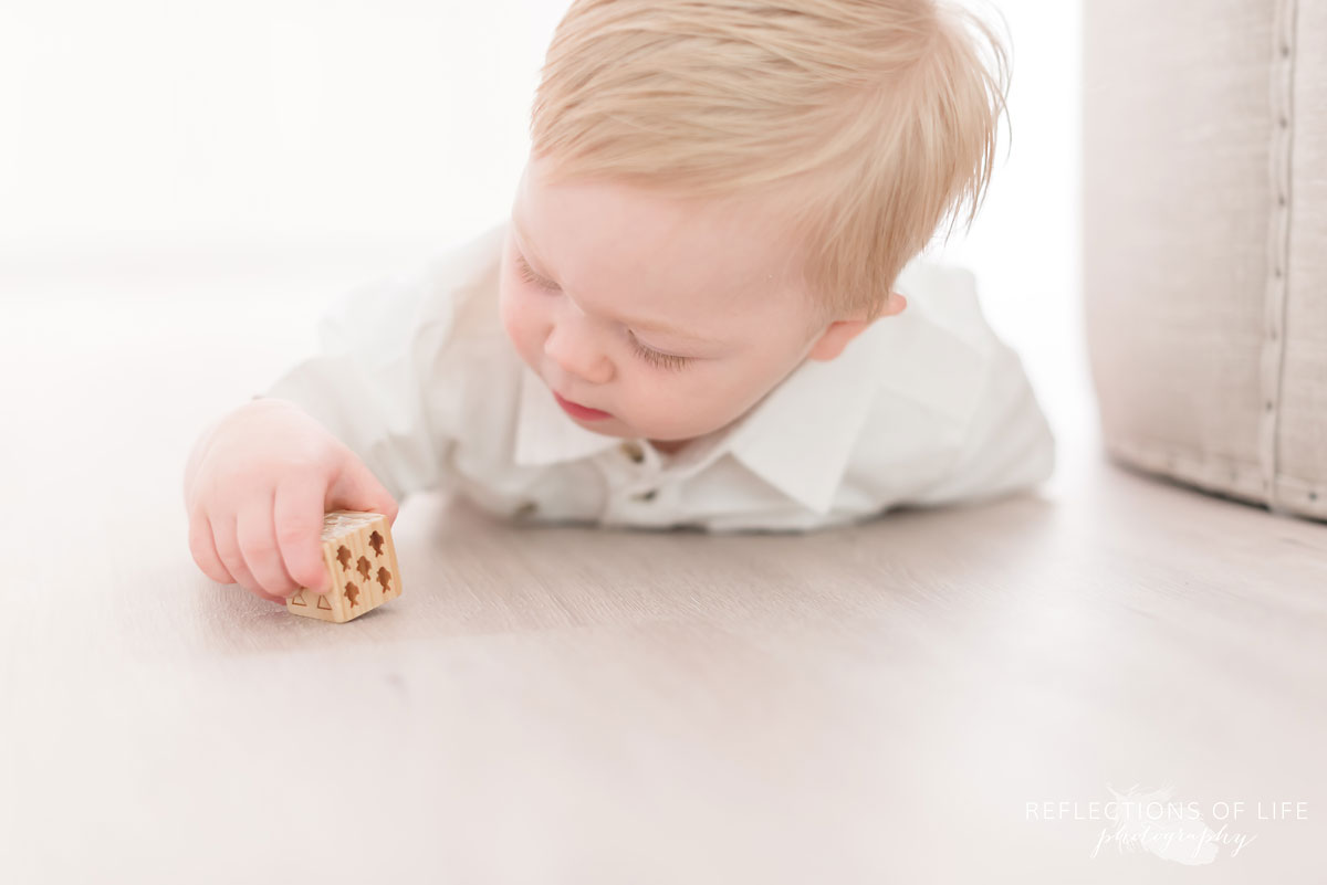 Grimsby photography baby laying on ground