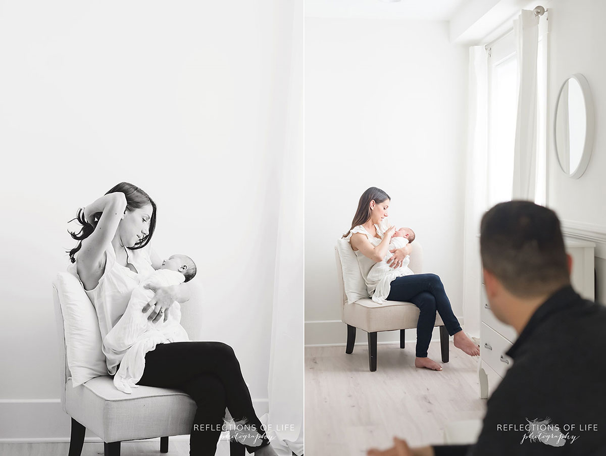 Father watching mother hold baby in grimsby ontario